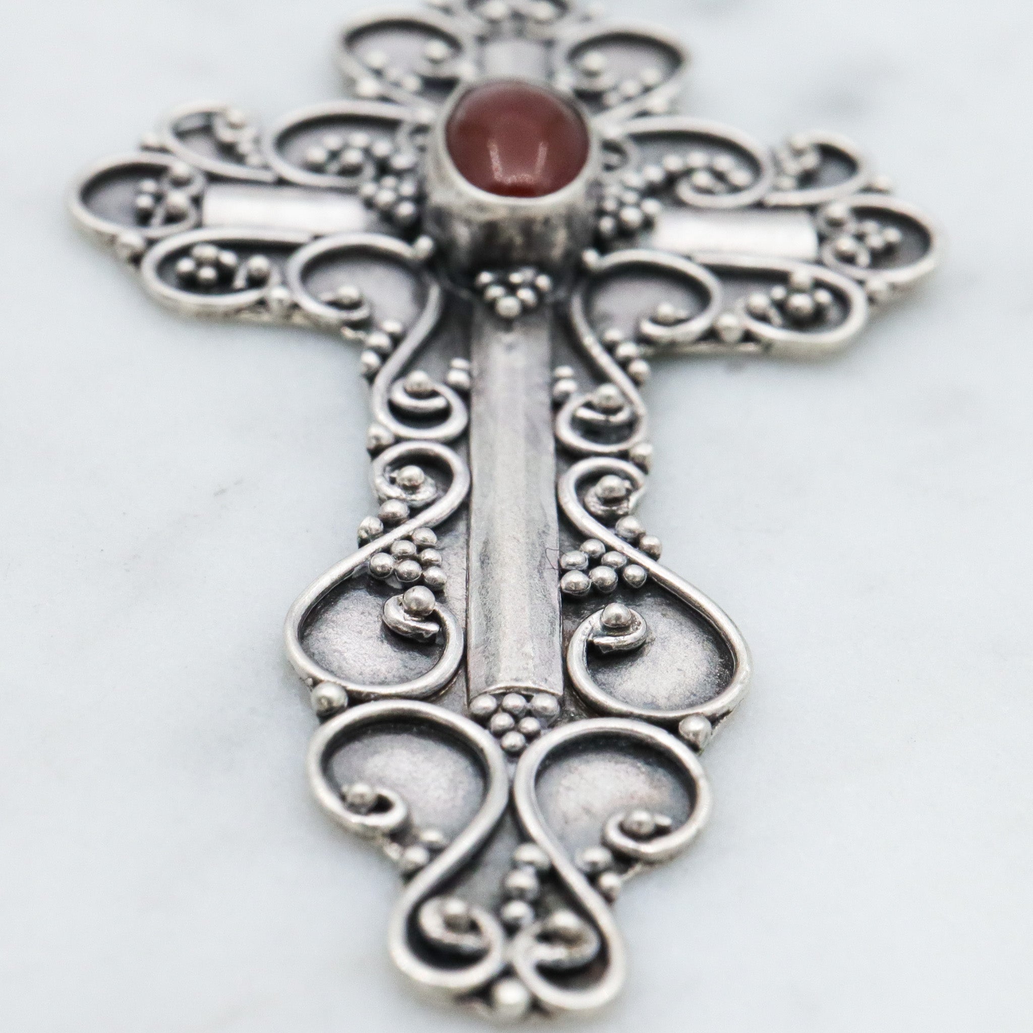 Vintage sterling silver & carnelian fancy scroll cross pendant